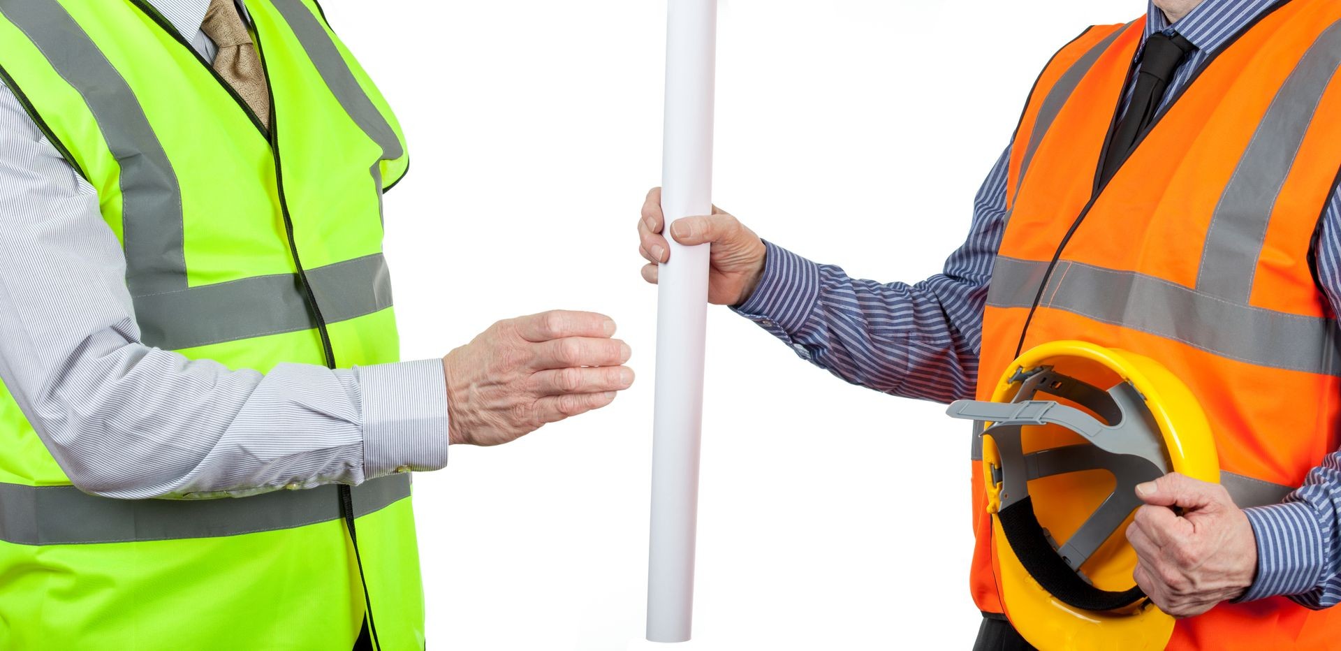 Two site surveyors in high visibility vests handing over site plans on a white isolated background